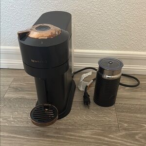 Nespresso Black Coffee Machine with Copper Accents